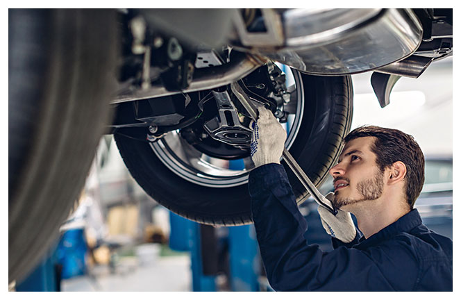 Mechanic under a car